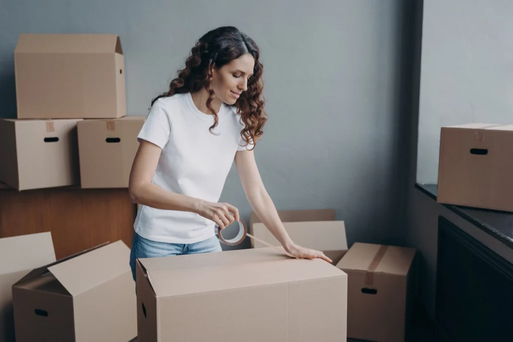 person packing boxes